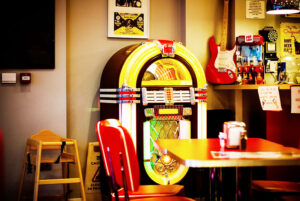 Jukeboxes like this one were a dream addition to a teenager’s game room or basement with big sound, bright lights, and lots of recordings inside. Gary Merritt of Webster is a special craftsman who repairs and restores jukeboxes, pinball machines and old slot machines. 