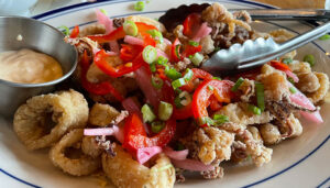 The lightly breaded calamari comes with crispy chickpeas, pickled peppers, onions and aioli.